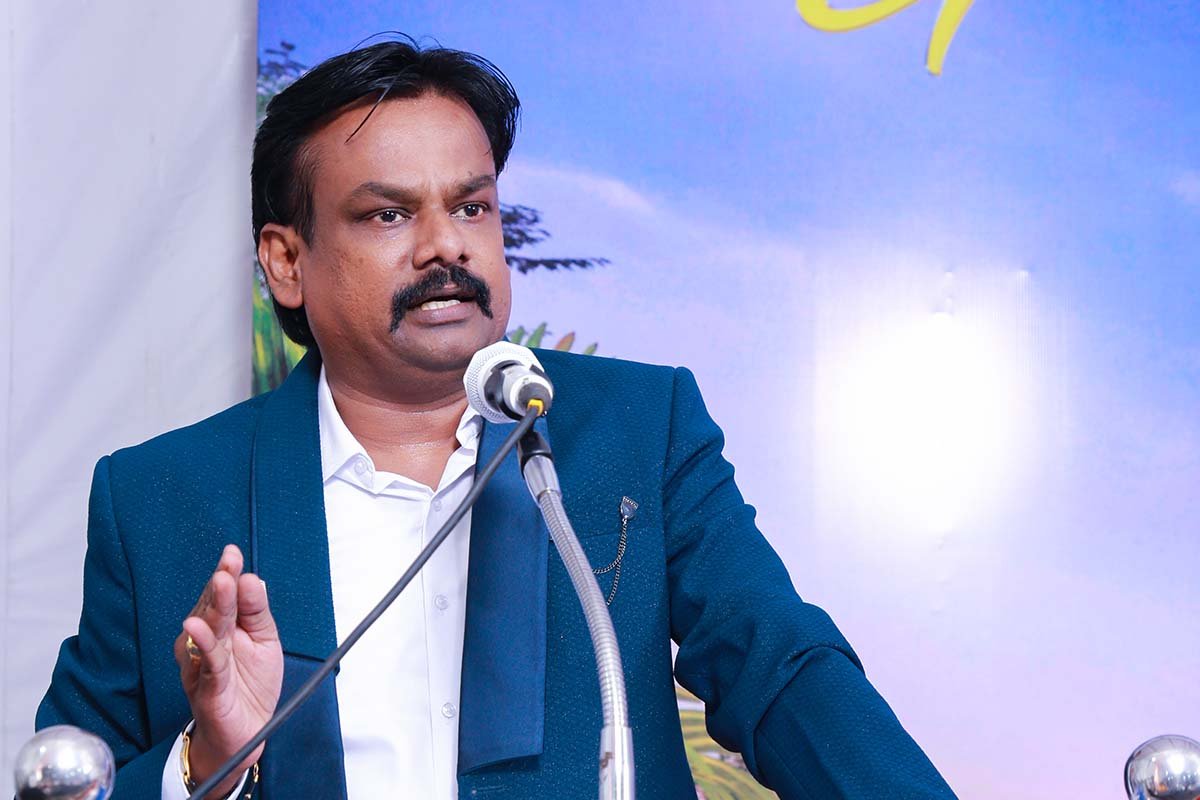 Mr. P. Saravana Kumar, founder of AnnaiBharath Housing, speaking at an event as the best architect in Madurai with 2000+ homes designed.